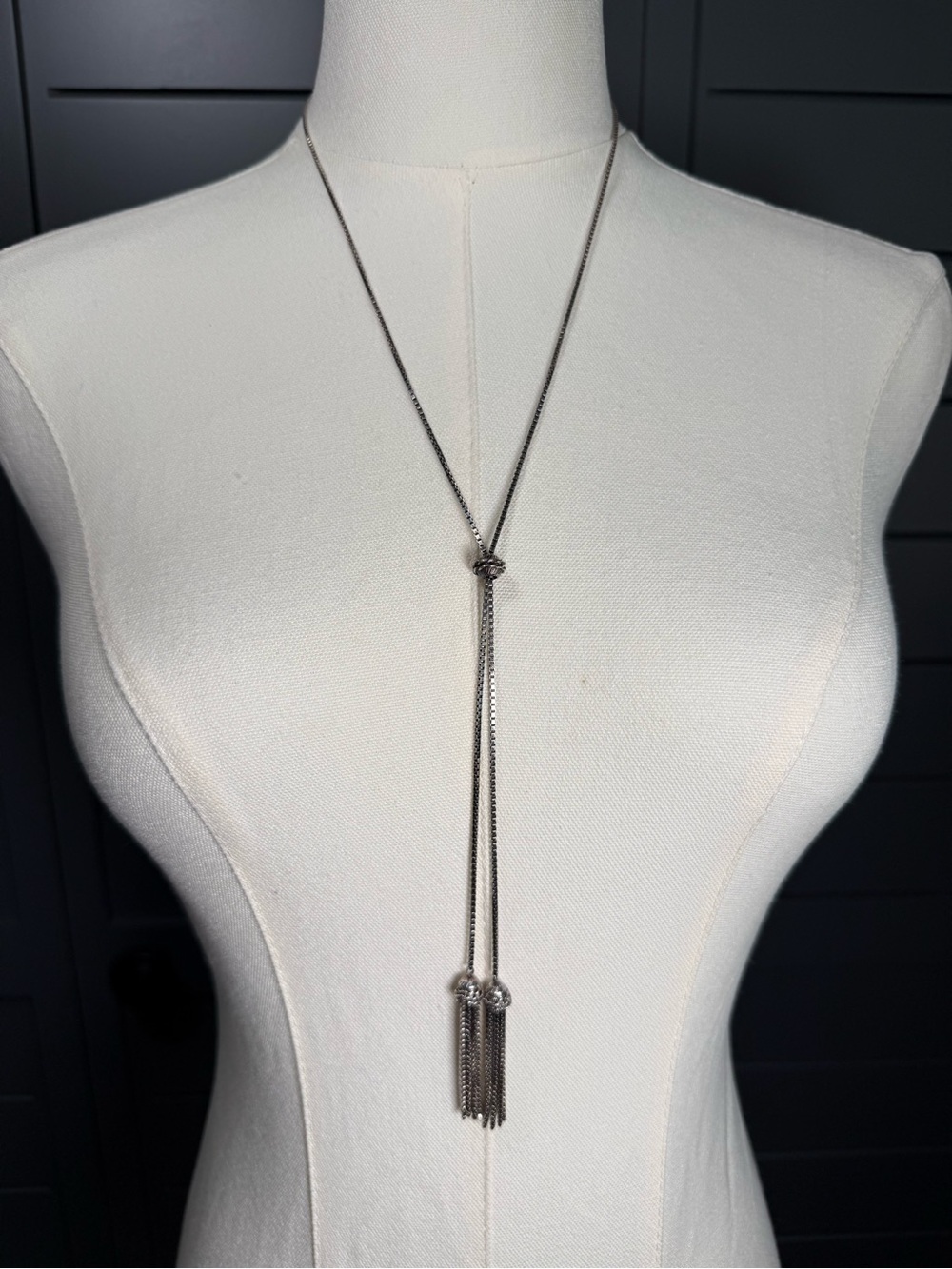 Elegant Silver Lariat Necklace with Tassel Accent